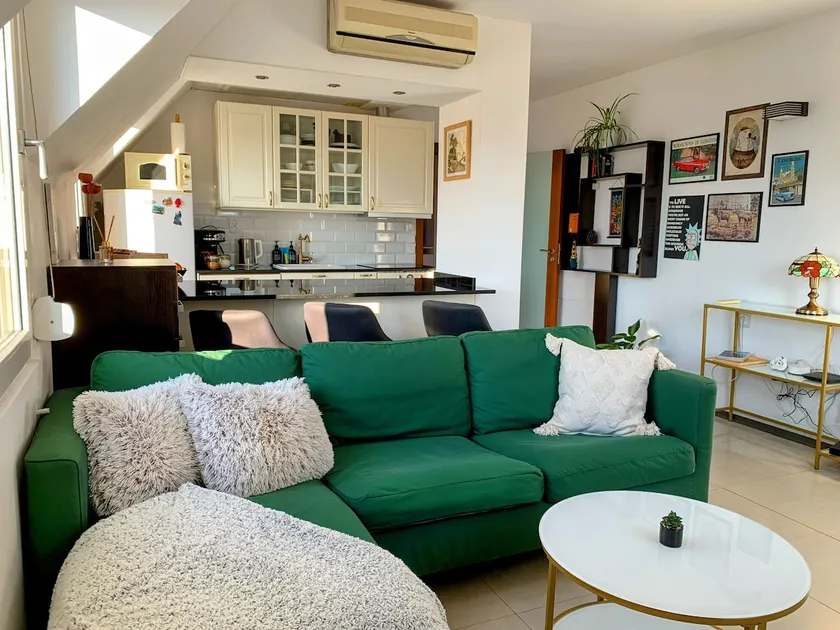 Cozy attic with city view - Image 1