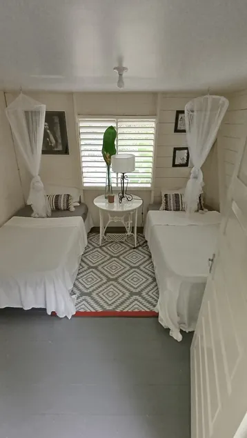 Kuzi Twin Room on Winifred Beach Road - Image 1