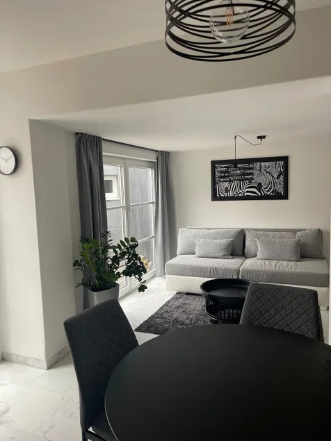 Cozy apartment with a patio - Image 1
