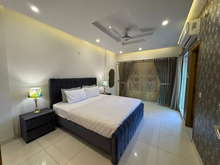 The Velvet Stay | 1BR | Self Check-in | Phase 7 - Image 1
