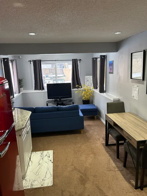 Bright Haven: Airdrie Cozy Basement Suite - Image 1