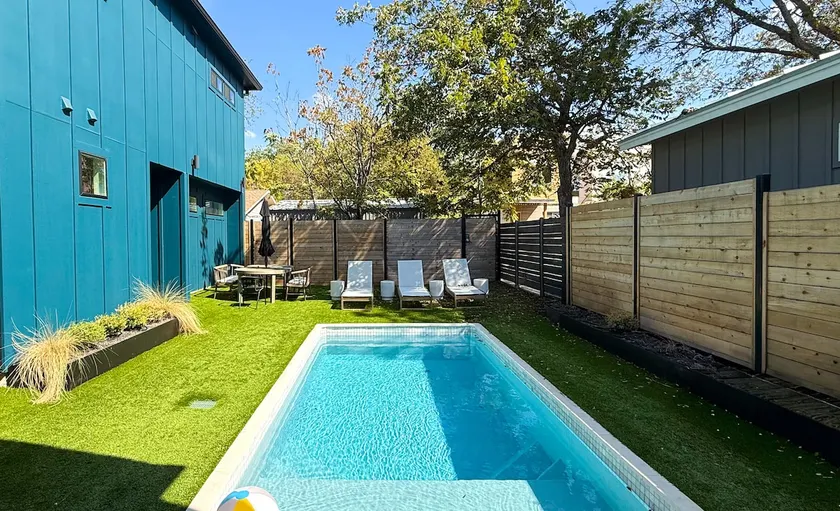 Modern Haven: Central Brand New Home w Heated Pool - Image 1