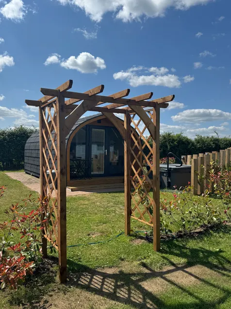 Windmill Glamping Pod with Hot Tub “The Snug” - Image 1