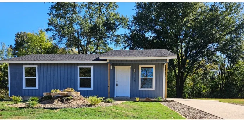 The Cozy Little Blue House - Image 1