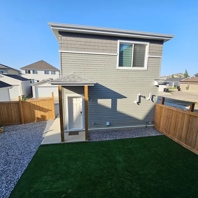 1BR Above Ground Garden Suite + Private Parking - Image 1