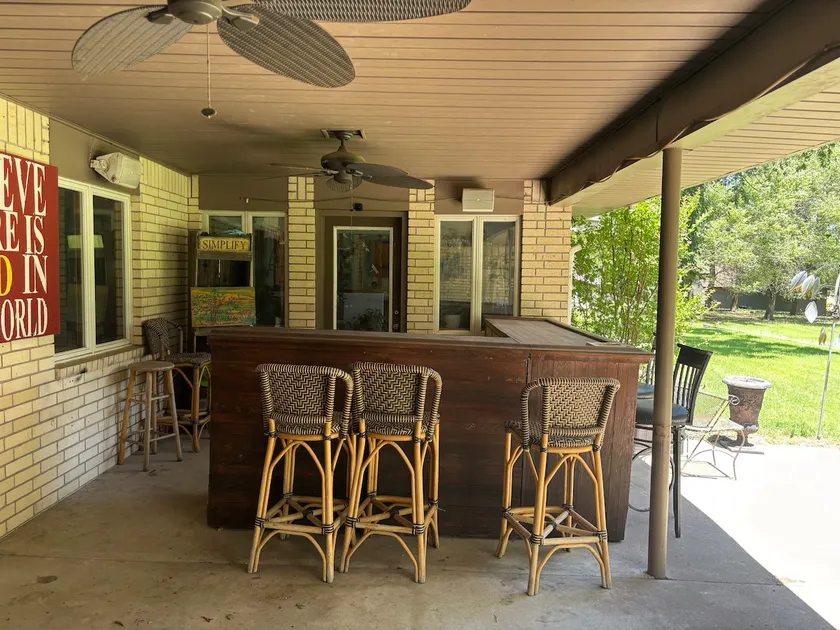 Spacious “El Cortez” home in town on two acres - Image 1