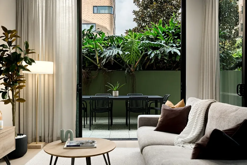 Stylish CBD Apartment with Courtyard and Parking - Image 1