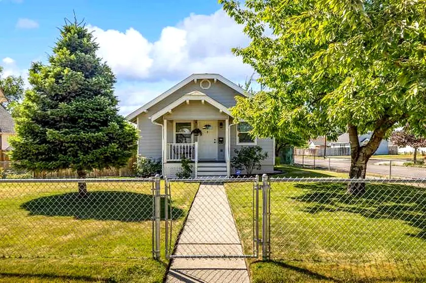 Cozy Bungalow w/ Yard • Near Parks & Hospital - Image 1