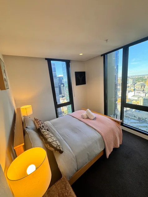 Spacious 70sqm CBD Apt · Skyline Views + Parking - Image 1