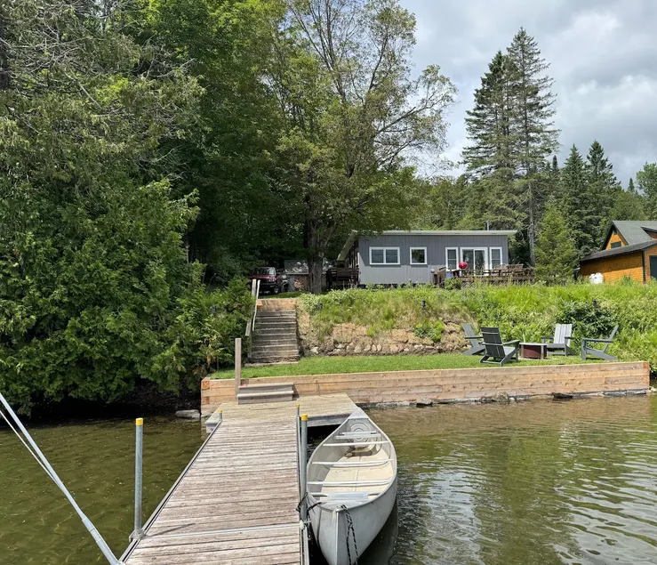 Lakeside Mid-Century Modern Cottage - Image 1