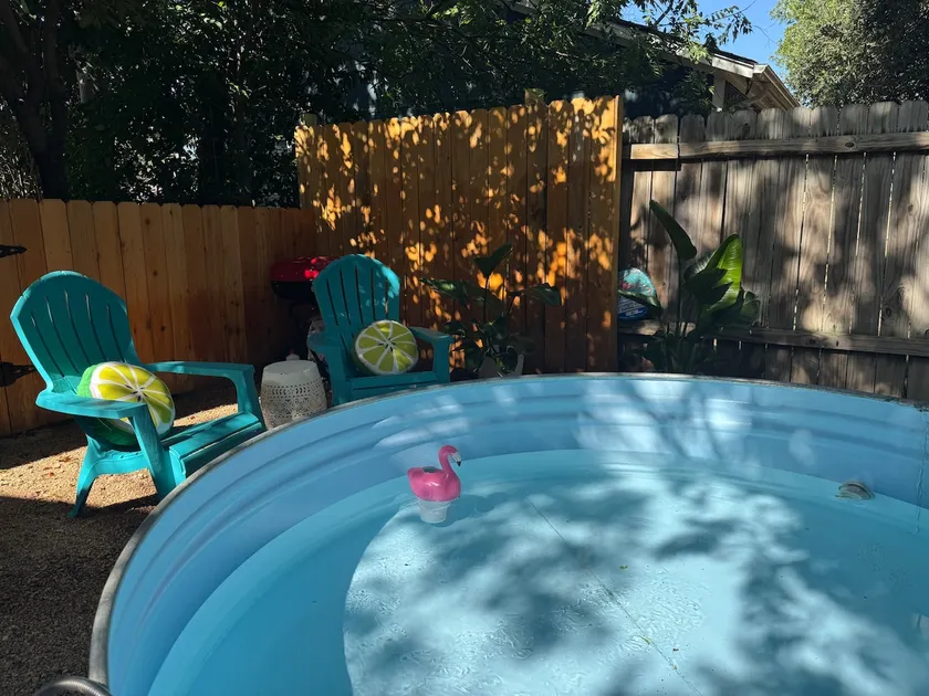 Fully-stocked home w/cowboy pool & luxury beds - Image 1