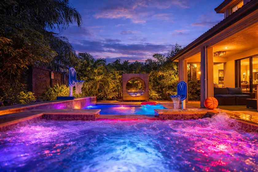 Glow Lakefront Villa, Heated Pool - Spa, 4K Cinema - Image 1