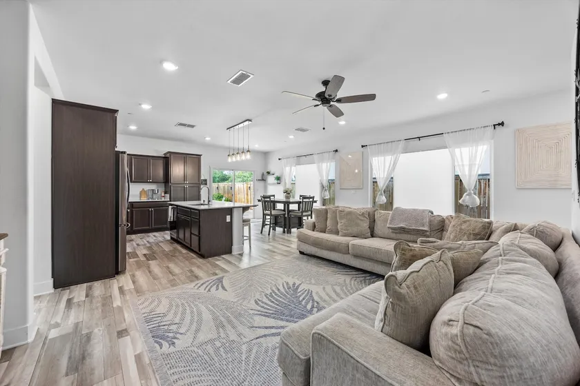 Cozy 3BR Retreat | Backyard & Garage Parking - Image 1