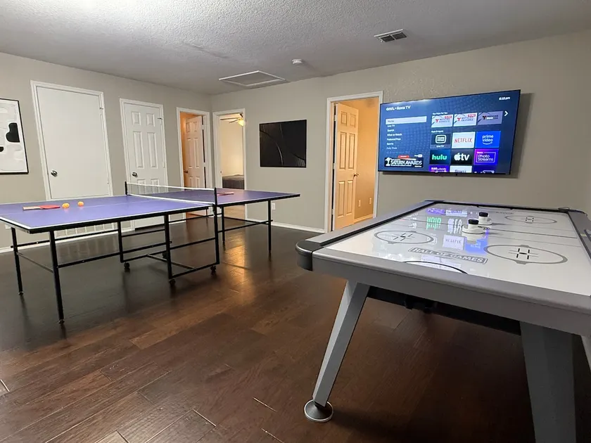 4 bed near JW Marriott Air hockey Ping pong tables - Image 1