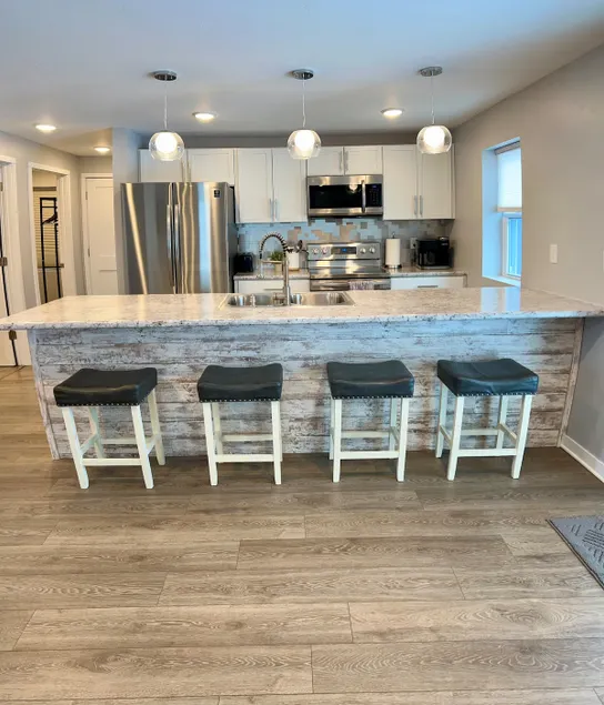 Updated Riverside Home in Oconto - Image 1