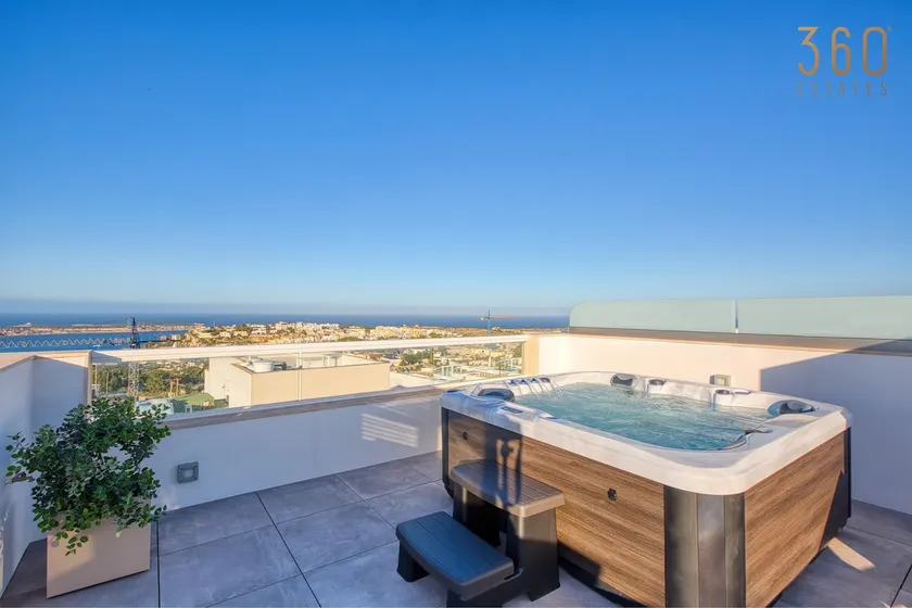 Steps from Ghadira Bay 2BR | Jacuzzi Penthouse - Image 1