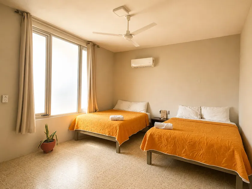 Mangos Apartment | AC+ Wifi+ Hot Water+ Kitchenette - Image 1