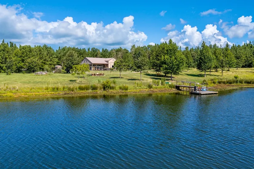 Secluded Waterfront Cabin: Pond, Hot Tub & Trails - Image 1
