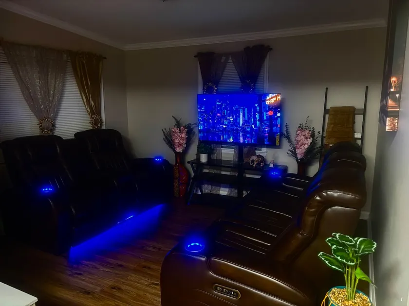 Cozy 3-Bedroom Escape with LED Reclining Sofas - Image 1