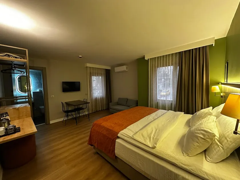Queen Room with Balcony for 4 People with Sofa - Image 1