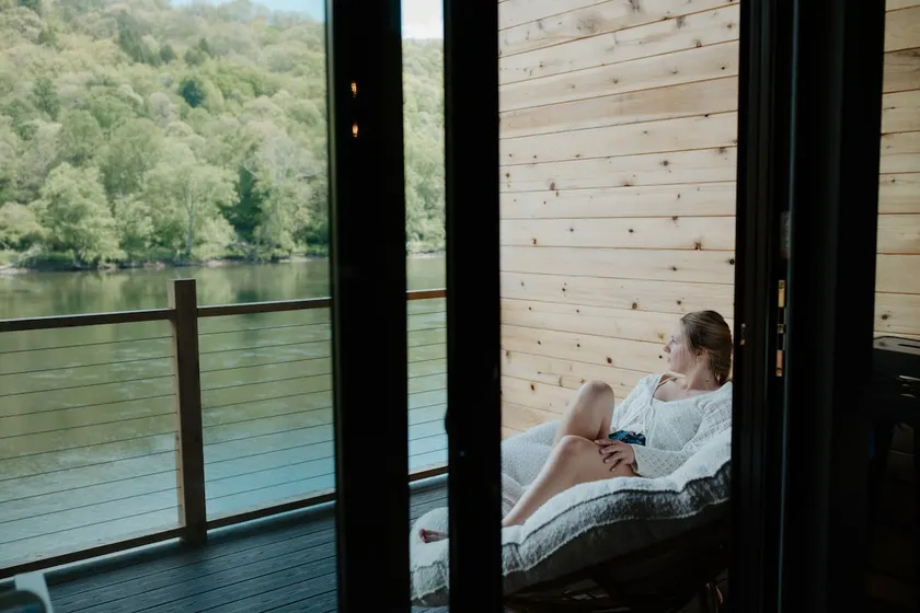 Riverfront Stylish Cabin w Firepit, Spa-Like Bath - Image 1