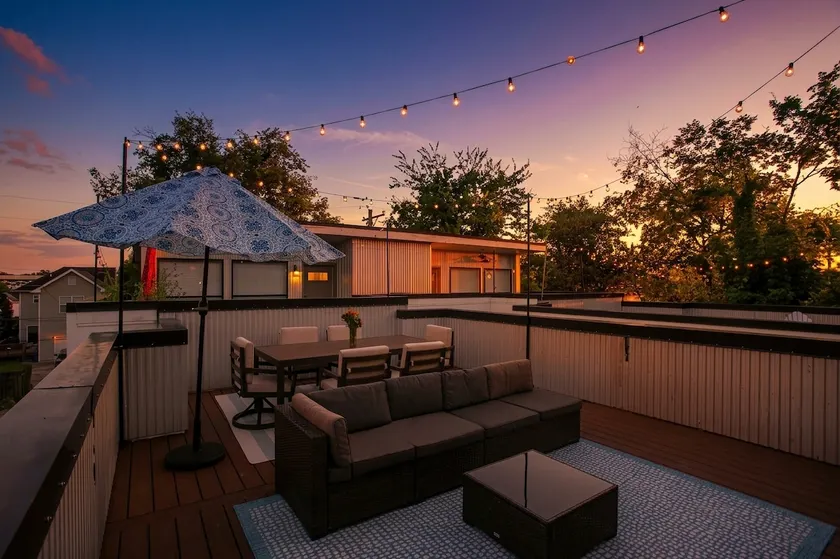 Dine Under the Stars on a Townhouse Rooftop - Image 1