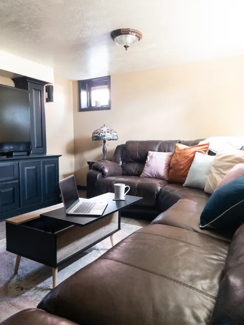 Cozy retreat in Pleasant Grove Home-Basement - Image 1