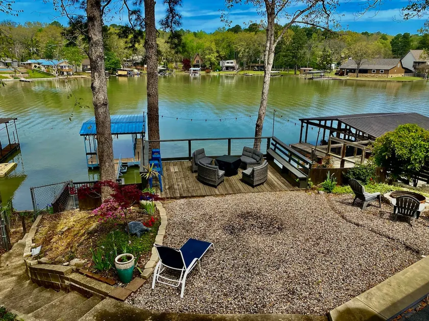 Lakehouse with 3 Decks, 2 Covered Boat Slips & Swim Dock!! - Image 1
