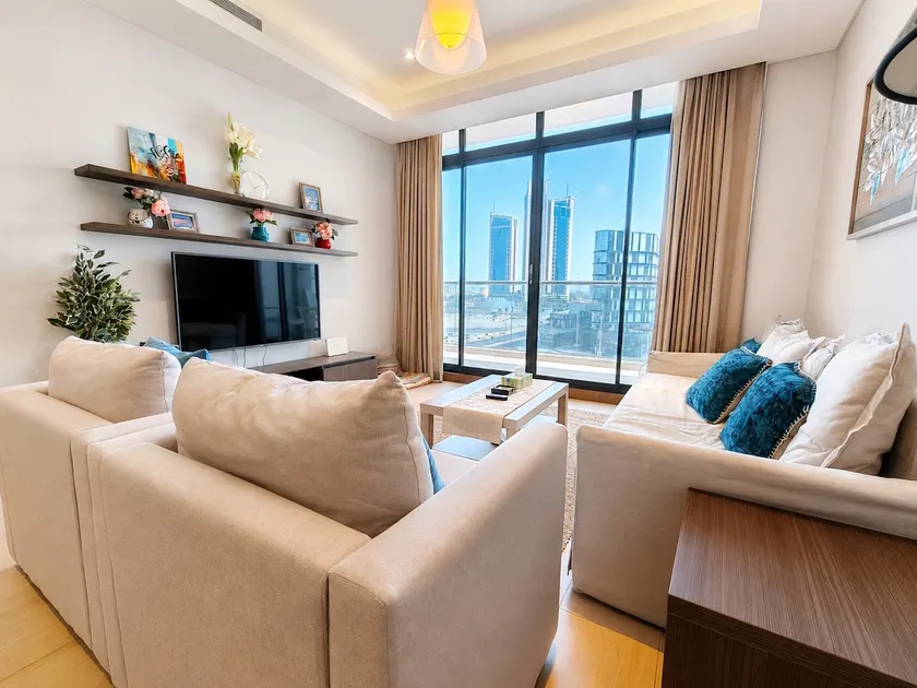1BR Seef Flat Facing City Center Mall Pool Gym - Image 1