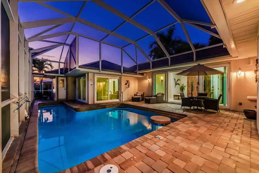 Villa Hibiscus-Waterfront-Free Heated Pool-Dock-Bikes-Other Amenities - Image 1