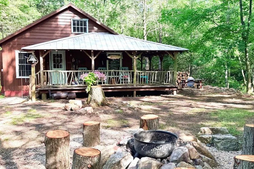 Cabin on Mountain Stream, Surrounded by Forest - Image 1