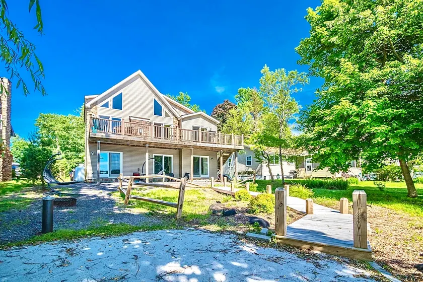 Spacious updated lakefront home with incredible views and personal dock/beach - Image 1