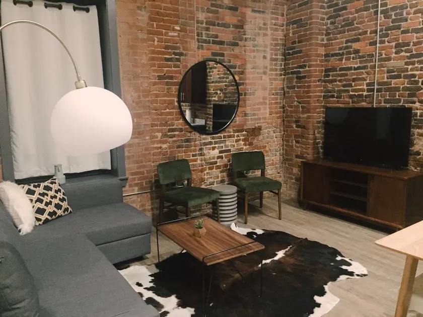 Modern Brick Loft > Best LOCATION Downtown!! 103 - Image 1