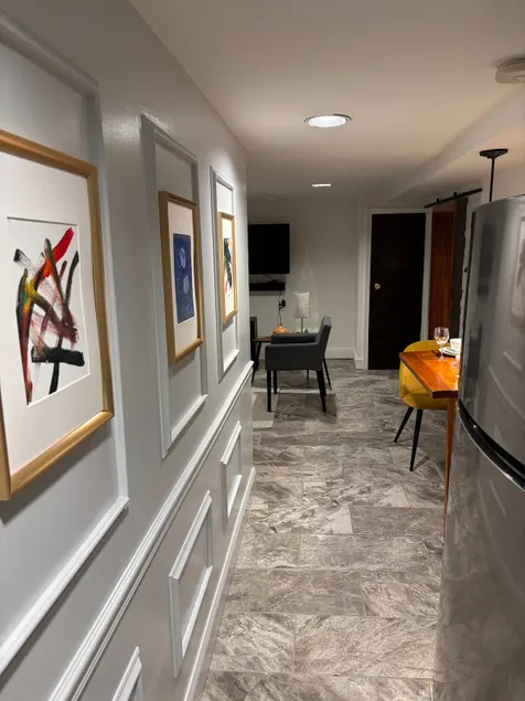 Cozy basement suite with a large backyard - Image 1
