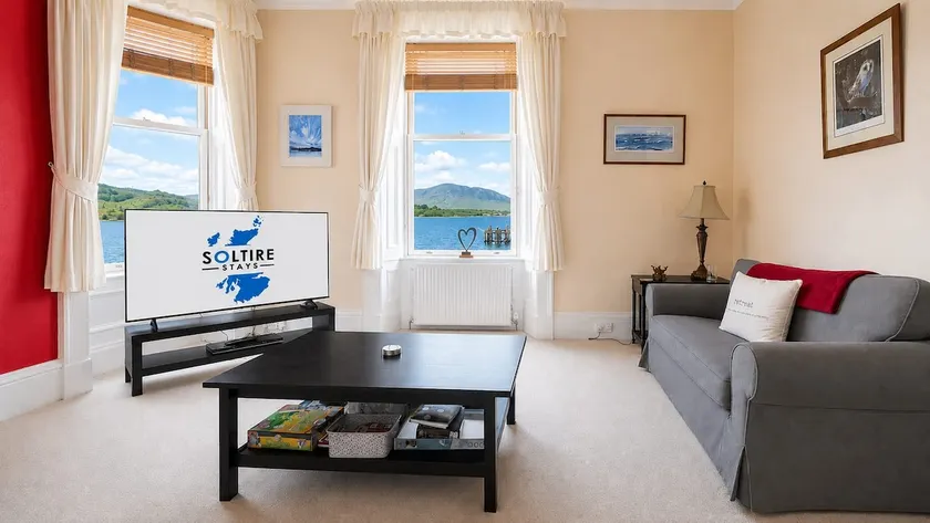 Scenic Waterfront Apartment with Stunning Loch Vie - Image 1