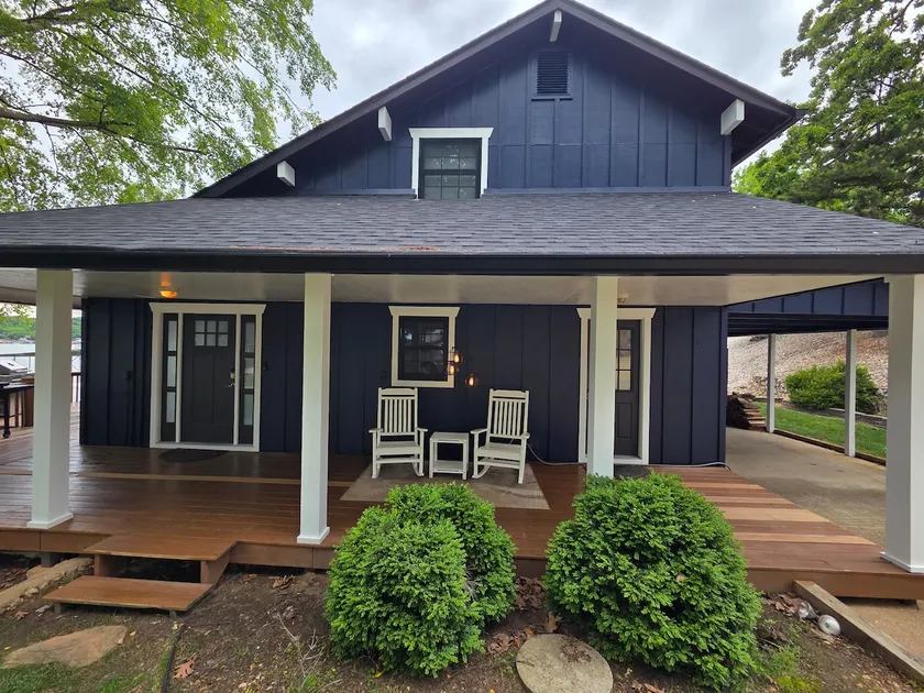 Rare level lot with boat launch on site. Wood burning fireplace. Dog friendly. - Image 1