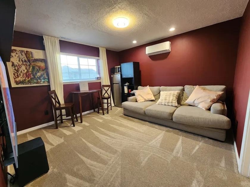 Cozy Suite: Hot Tub, EVCharger, 65” OLED, Best Bed - Image 1
