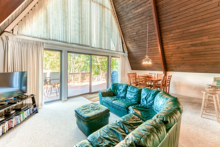 A-frame 2BR with lake views, dock, spacious deck - Image 1