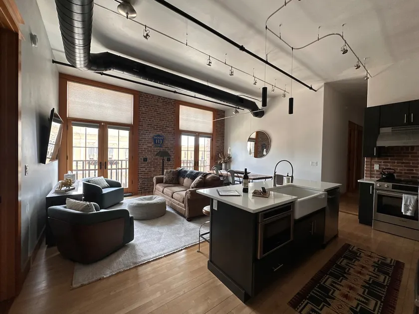 Chic 3BR Industrial Loft: Main St. w/ Garage - Image 1
