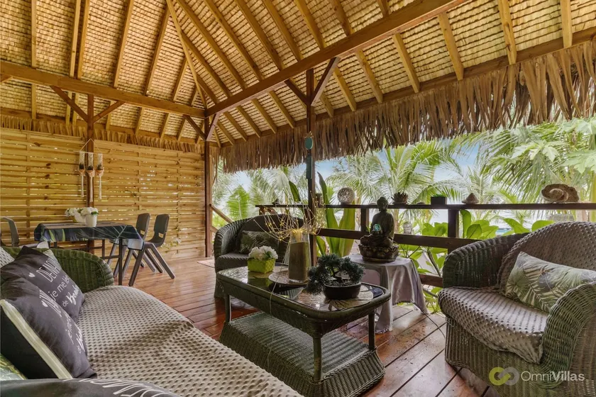 Beachfront Bungalows With Sunset Views in Haapiti - Image 1