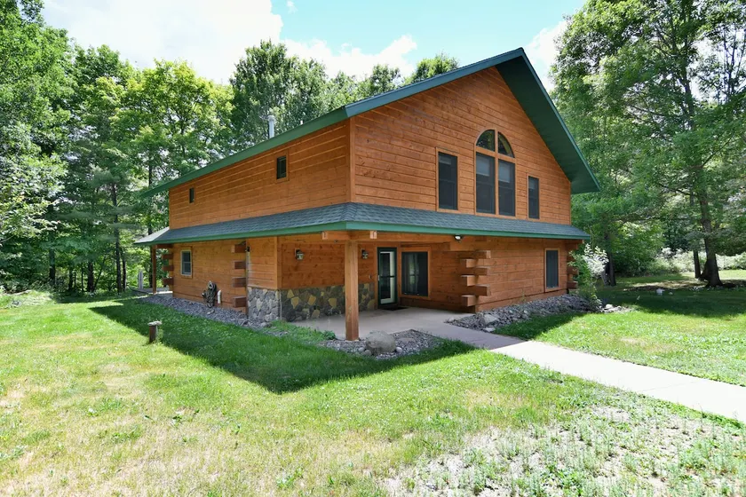 Whispering Waters Lodge with Waterfall, Pond and Trails on Property in Delta, WI - Image 1