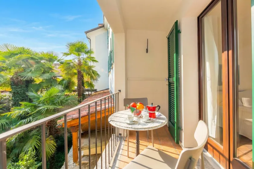 Casa Chiara Muralto with Balcony & Wi‑Fi - Happy Rentals - Image 1