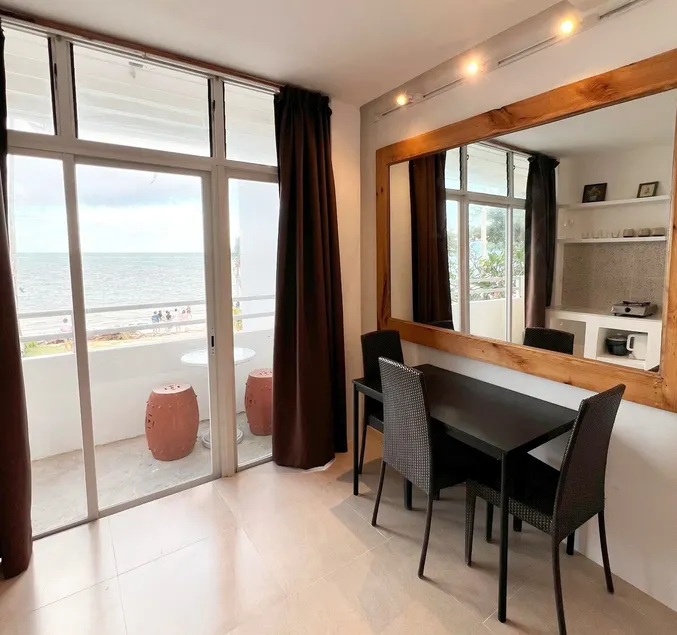 Absolute Beachfront Studio with Kitchen & Balcony - Image 1