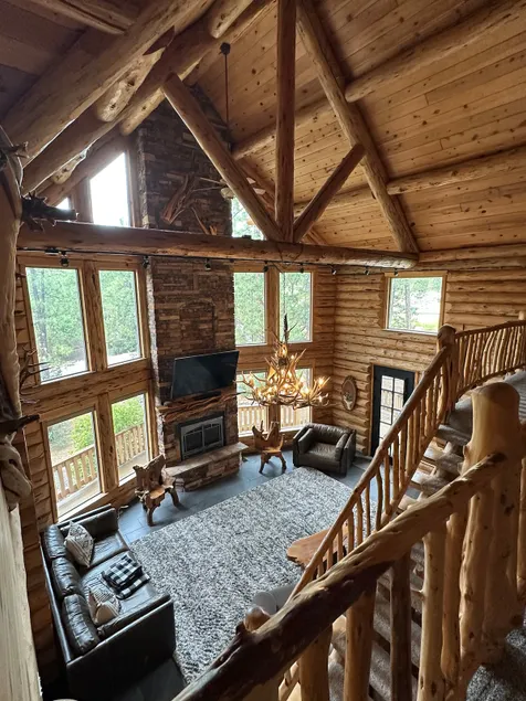 Stunning 3 story modern log cabin on 1.5 acres! - Image 1