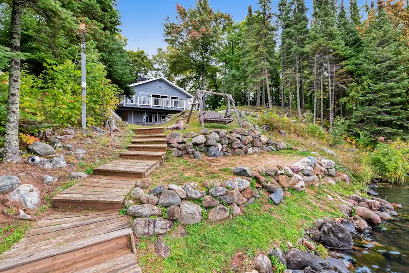Lakefront Family Home with Pier Views & Canoe - Image 1