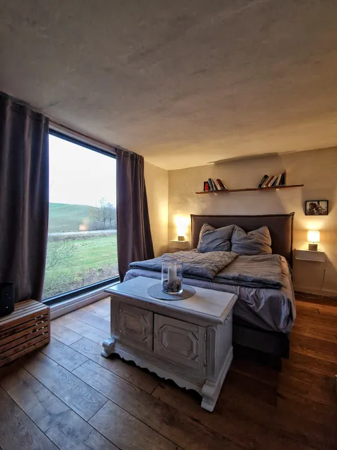 Clay half-timbered house in the foothills of the Harz Mountains in the countryside. - Image 1