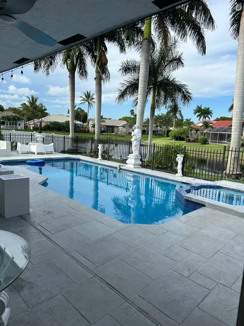 Chic 4BR Lakefront Home with Private Pool - Image 1