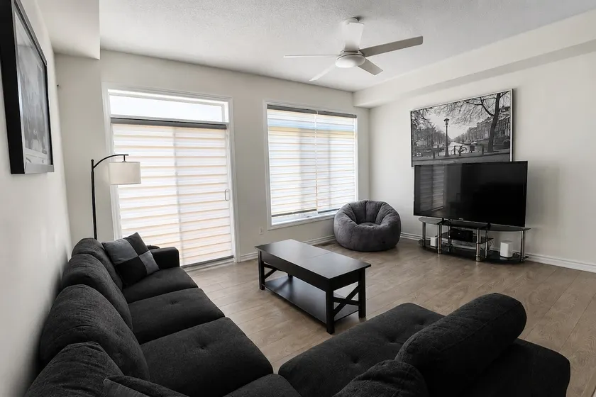 KoziNest Smart 2BR Home—Near Shops, Dining & Beach - Image 1