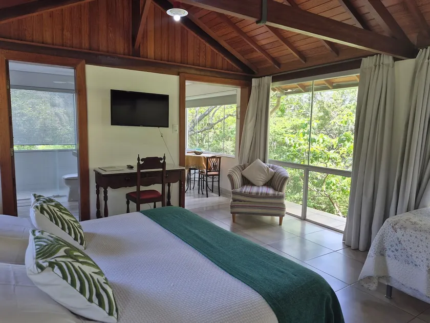 Entire house surrounded by greenery - Image 1