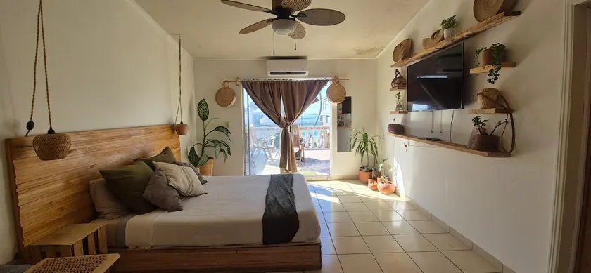 A cozy suite with an ocean view and a private terrace - Image 1